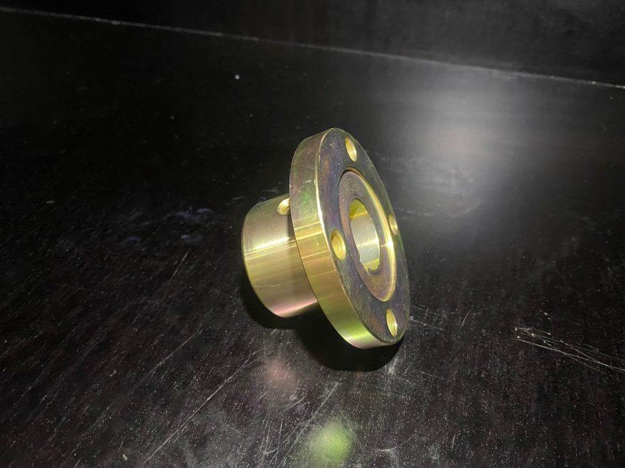 1310 Flange Coupling with ¼″ keyway, zinc-coated, for 1 ¼″ input shaft, showing bolt-hole pattern.