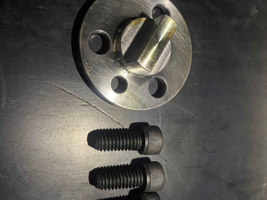 Chevrolet Water Pump Cam Drive plate with three mounting holes and drive tab, AM1059